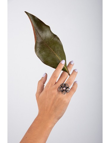 Silver ring with pearl.