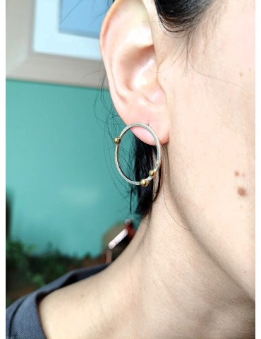 Ασημένια μοντέρνα Σκουλαρίκια.